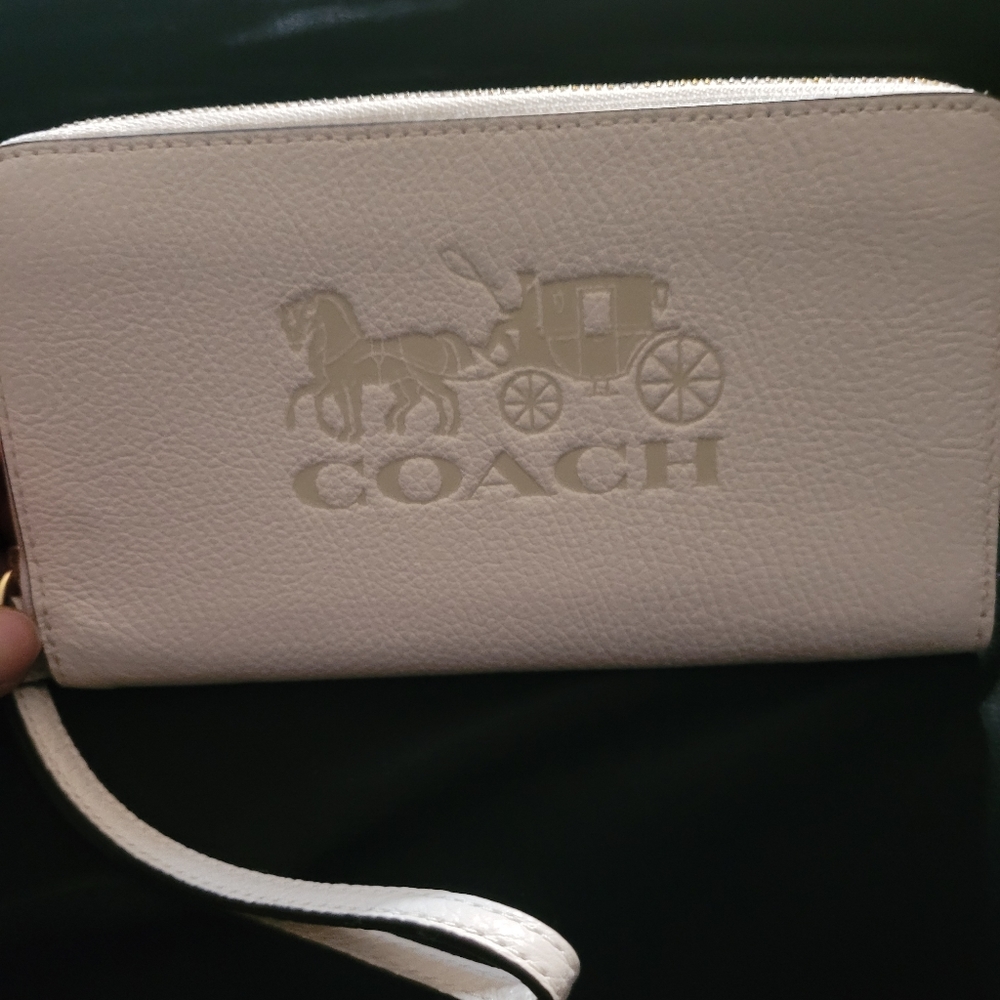Coach wristlet, cream outside brown inside